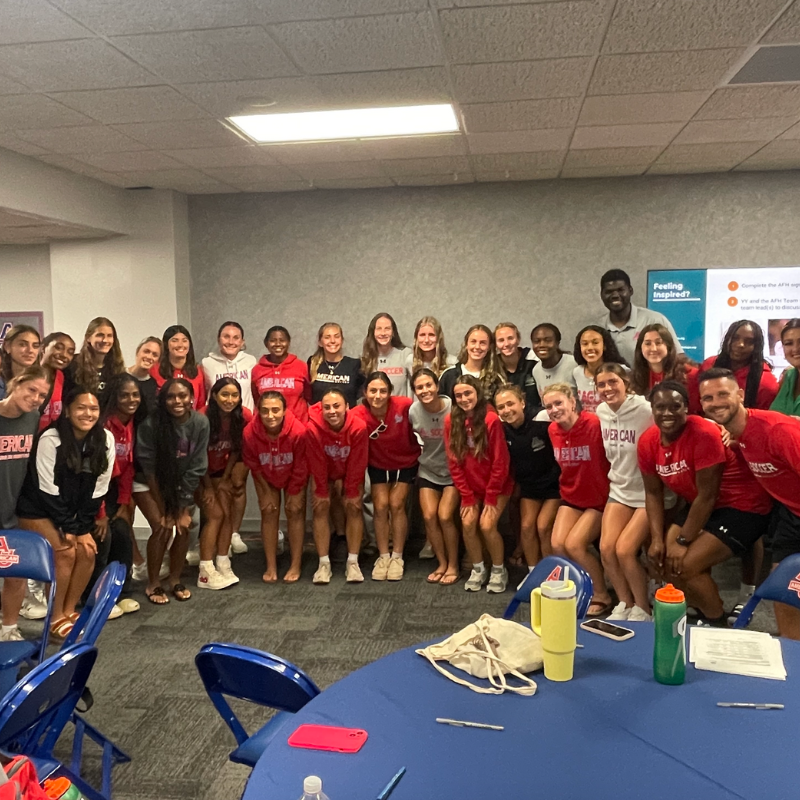 Group photo of American women's soccer after AFH's Empowerment workshop.