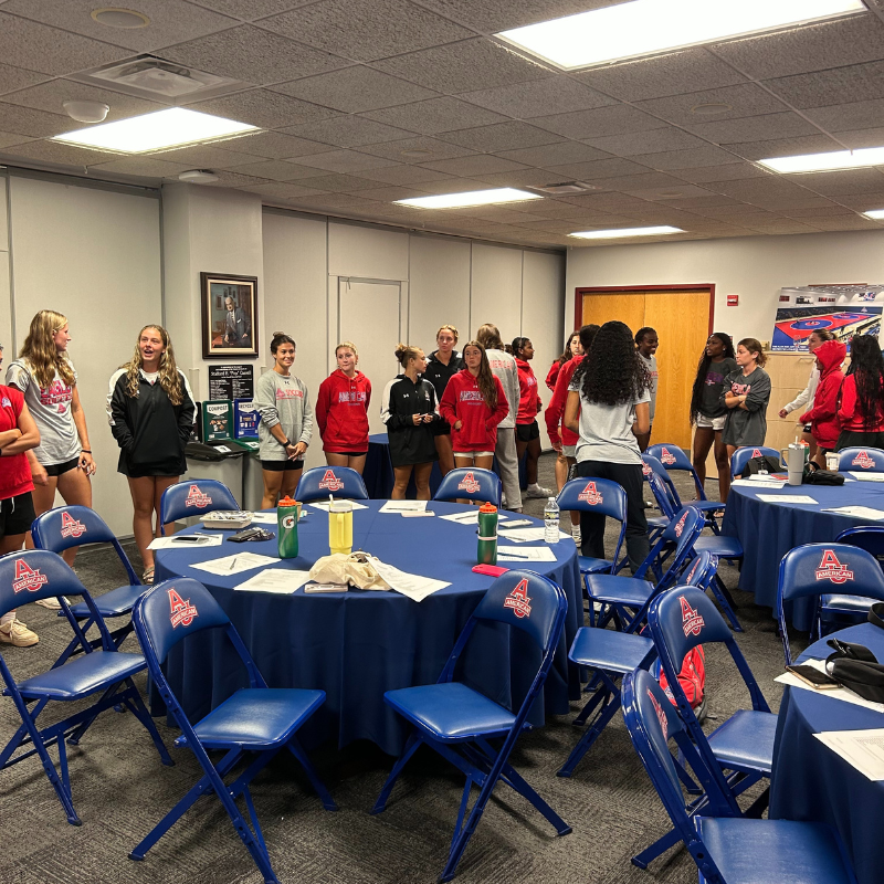 American Women's soccer participating in an AFH U Empowerment workshop