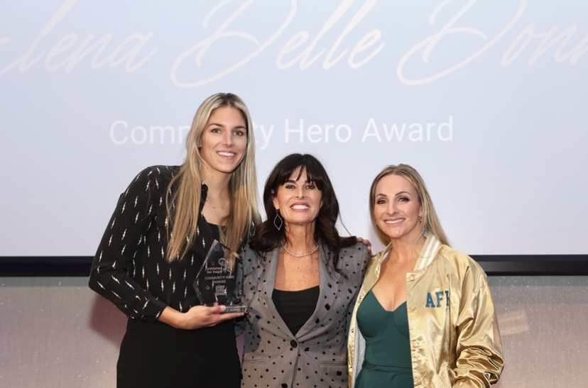 Elena Delle Donne (left) poses next to Michelle Freeman and Christin Blyumin after receiving her AFH Community Hero Award.